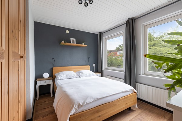 Foto - Te koop: Sfeervolle tussenwoning met groene oase!